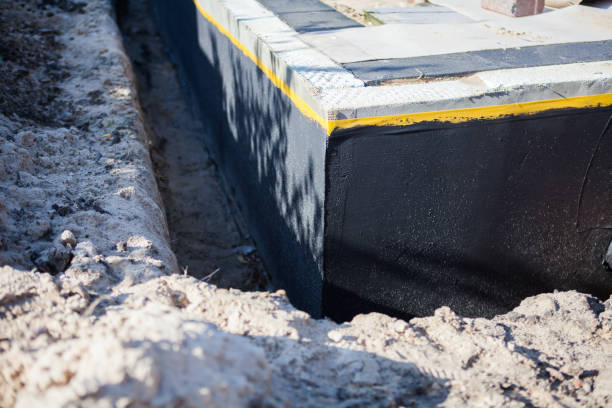 Professional Waterproofing technician working in Fletcher, NC